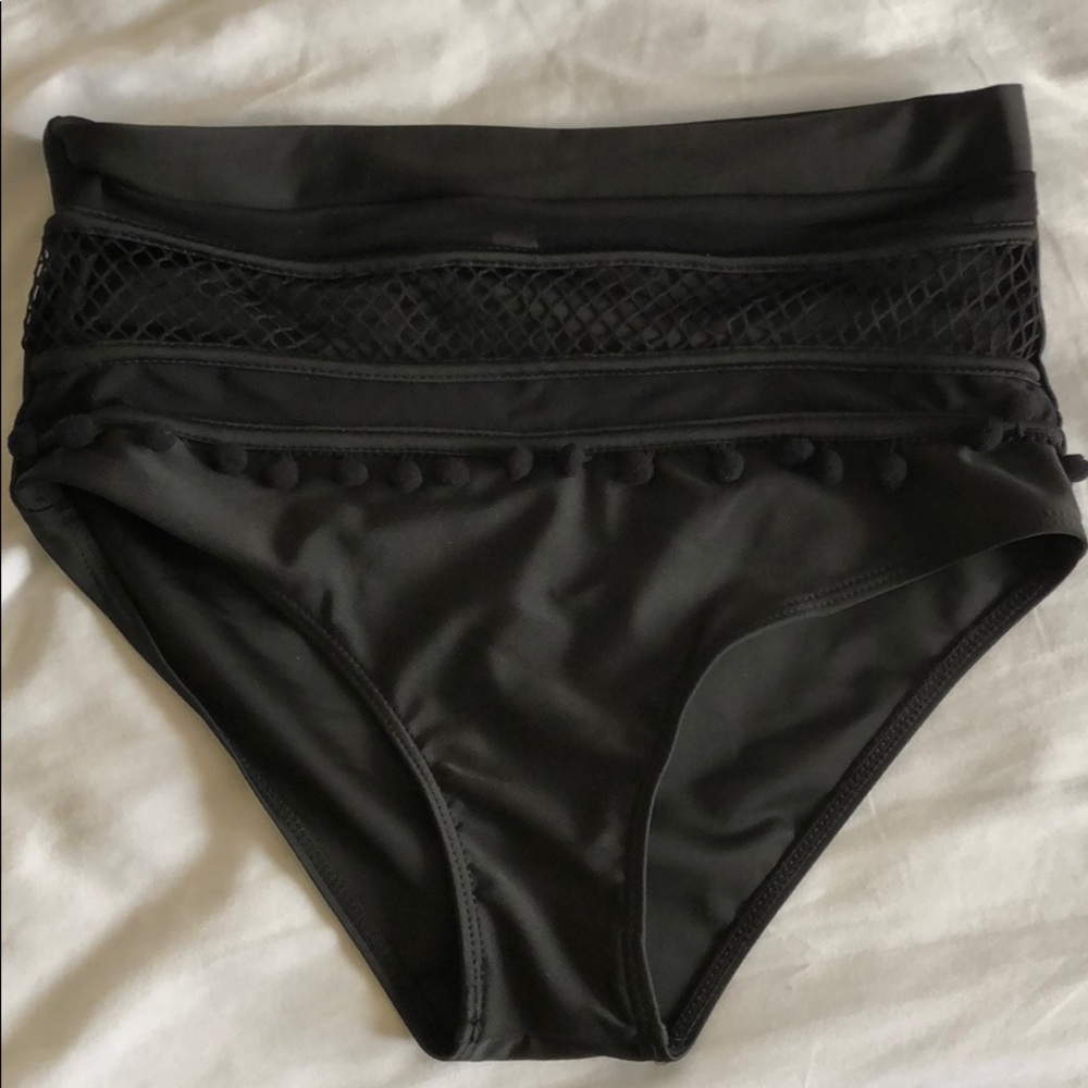 Black two piece bathing suit with high rise bottom